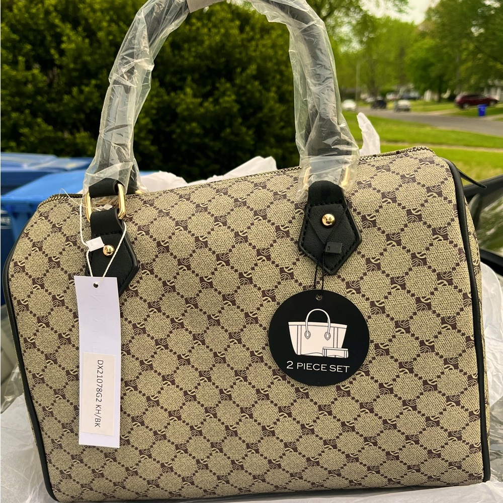 Brand New- Luxury handbag with wallet at an affordable price.